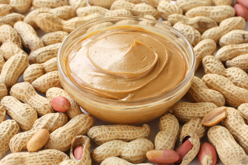 Peanut butter in a pile of peanuts